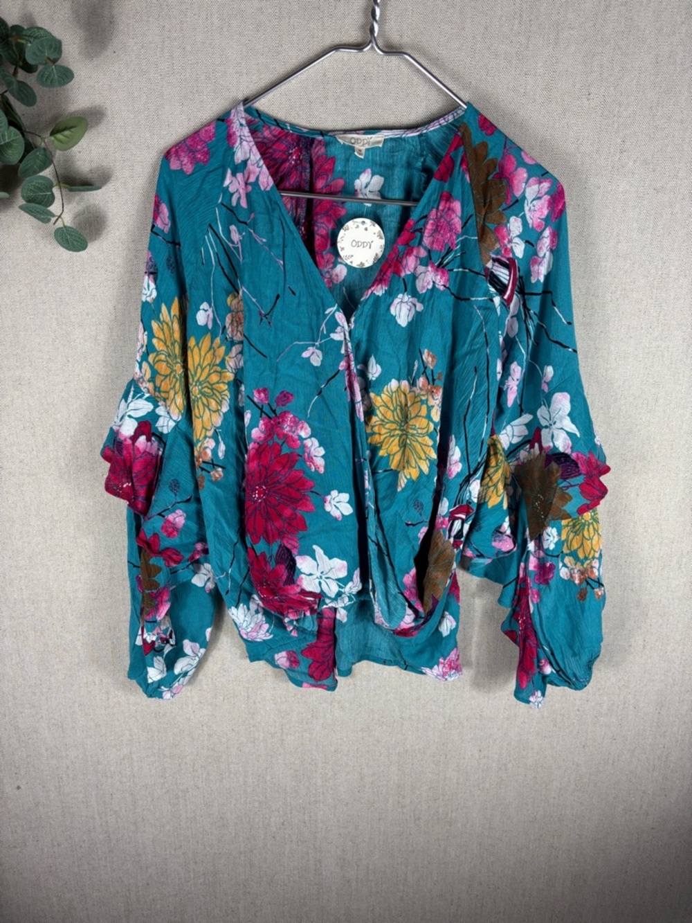 Oddy > New with Tags Teal Floral Wrap Blouse Medium
